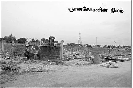 அரசு நிலத்தை அபகரித்தாரா?