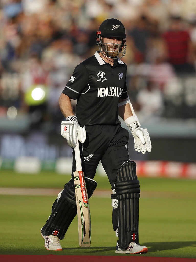 Kane Williamson walks off the pitch after being given out.