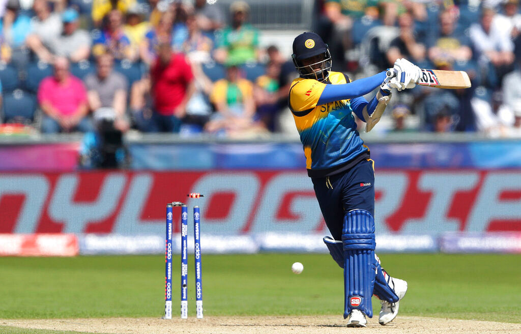 Angelo Mathews is bowled by South Africa's bowler Chris Morris.