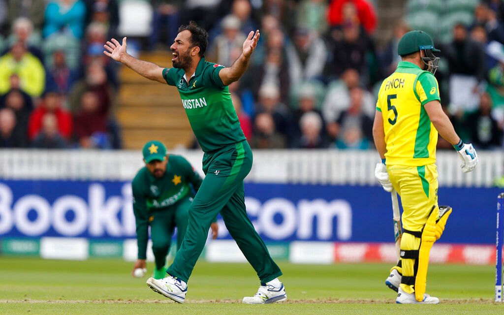 Pakistan's Wahab Riaz reacts after Asif Ali miss the catch.