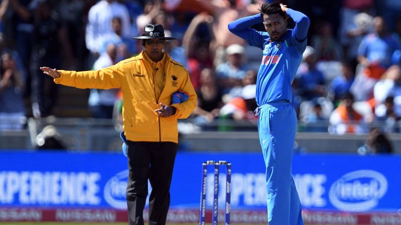 Umpire Kumar Dharmasena signals No-ball during a match