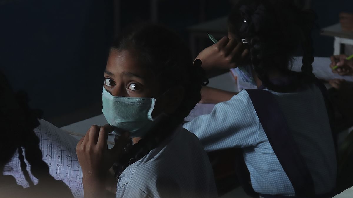 Girl wearing mask to protect from Covid - 19