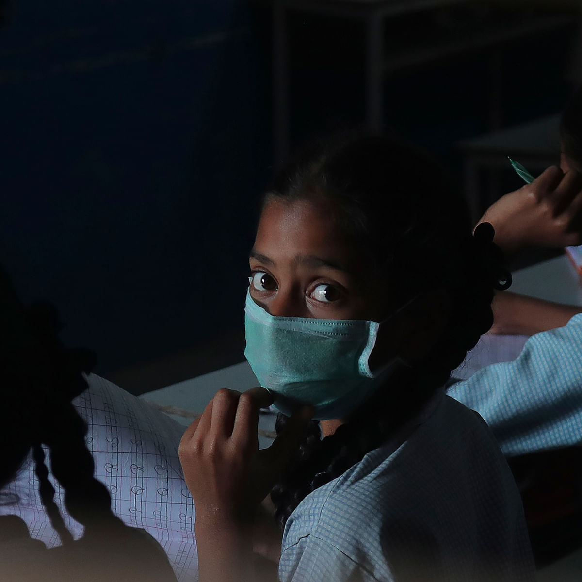 Girl wearing mask to protect from Covid - 19