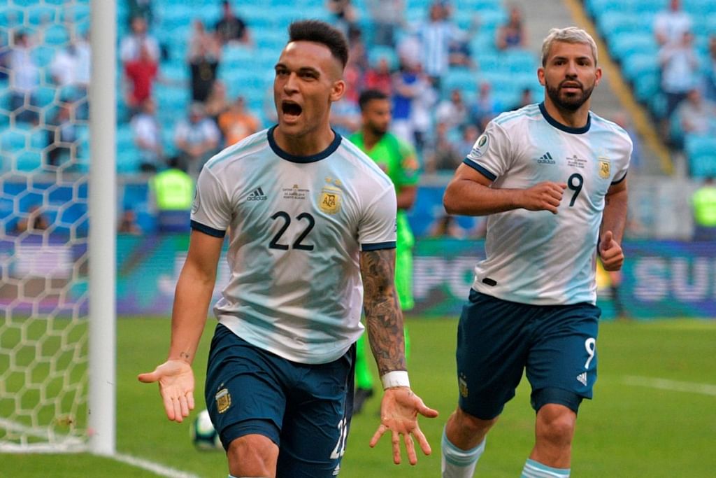 Lautaro Martinez with Aguero