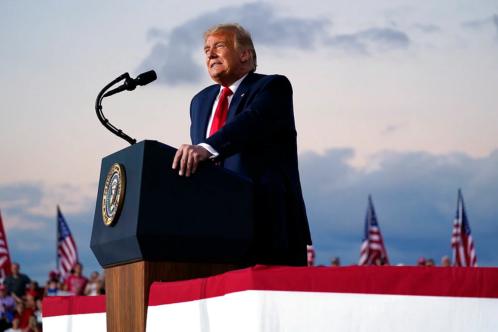 US President Donald Trump speaks during a campaign rally at Orlando Sanford International Airport