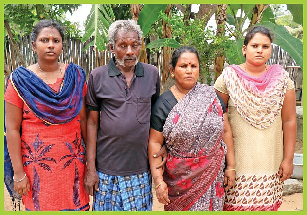 குடும்பத்தினருடன் முருகாண்டி