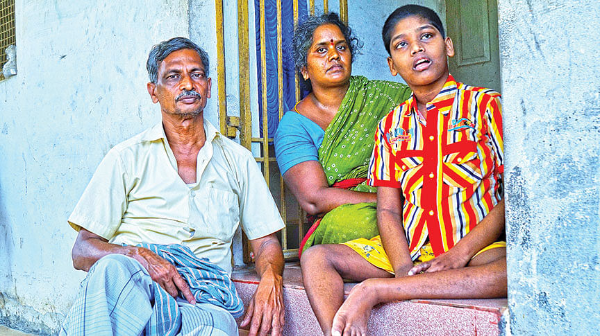 பெற்றோருடன் பாவேந்தன்