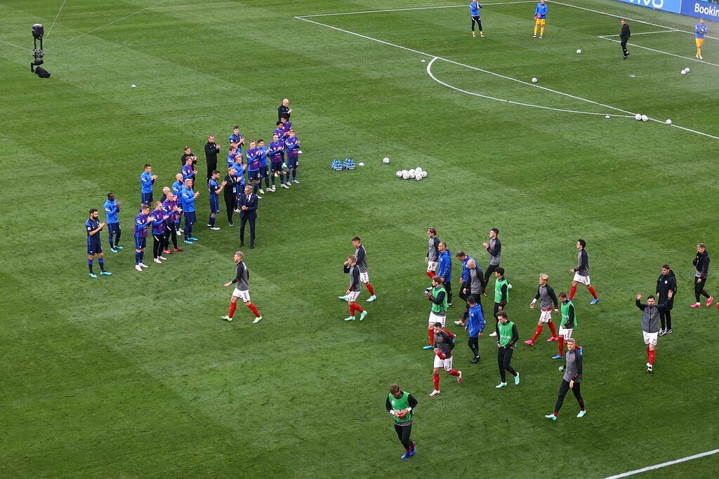 Denmark players returning to the field