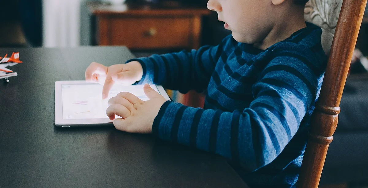 Kid with Gadget