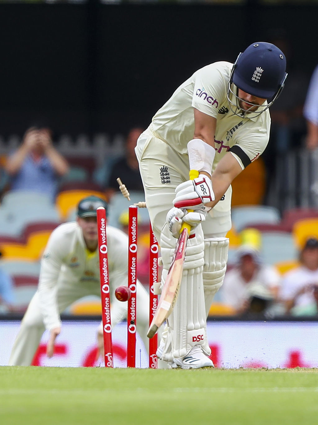 Rory Burns losing his stumps for a Starc Yorker