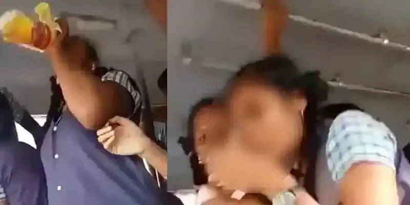 ஓடும் பேருந்தில் மது அருந்தும் மாணவிகள்
