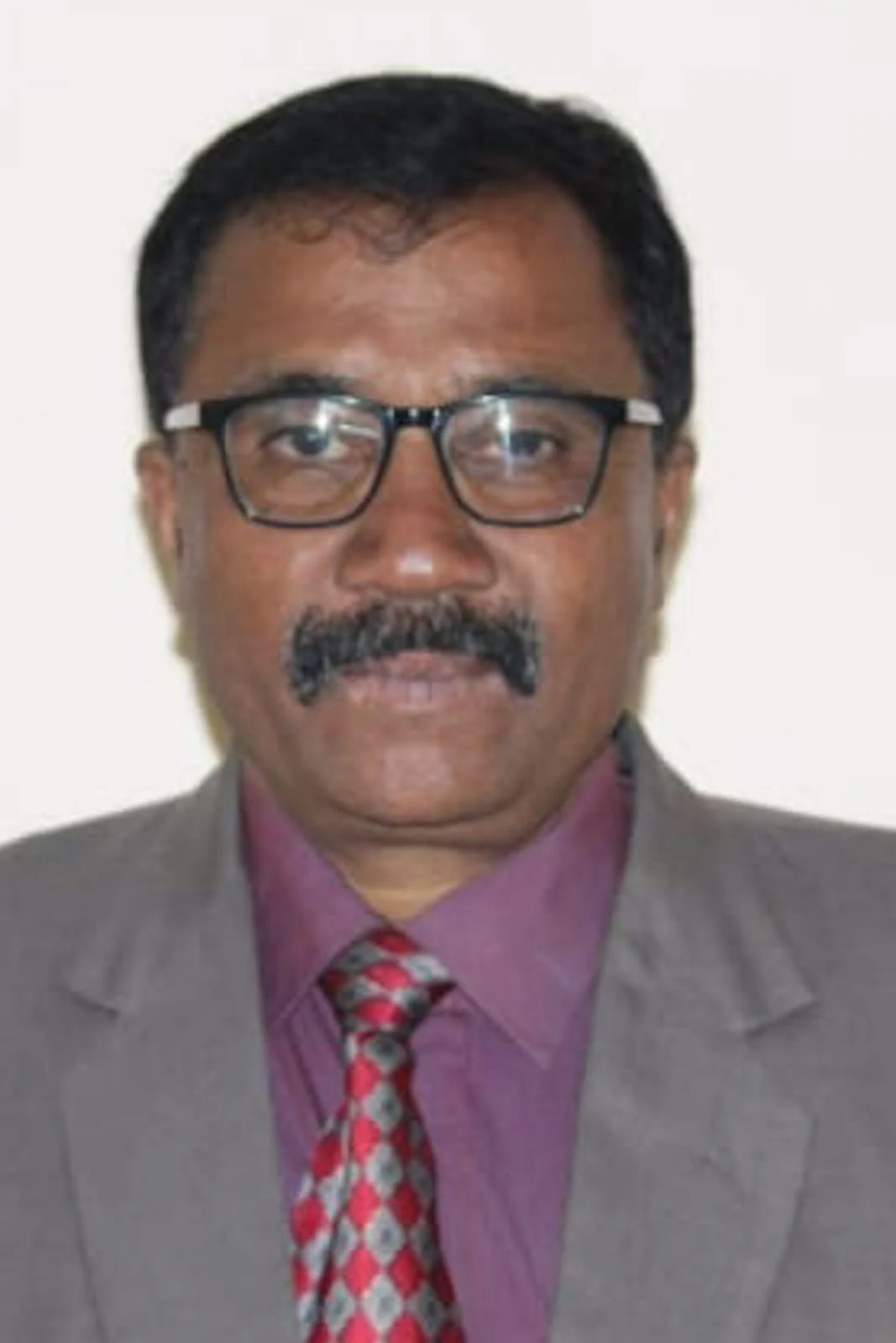 அத்துமீறலில் ஈடுபட்டதாகக் கூறப்படும் பேராசிரியர் தர்மலிங்கம்