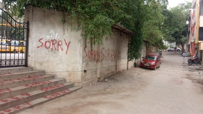 'Sorry' written on school wall