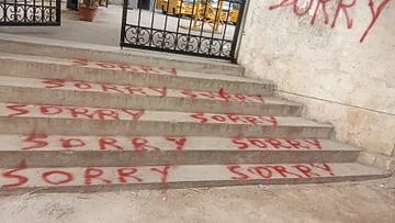 'Sorry' written on school steps