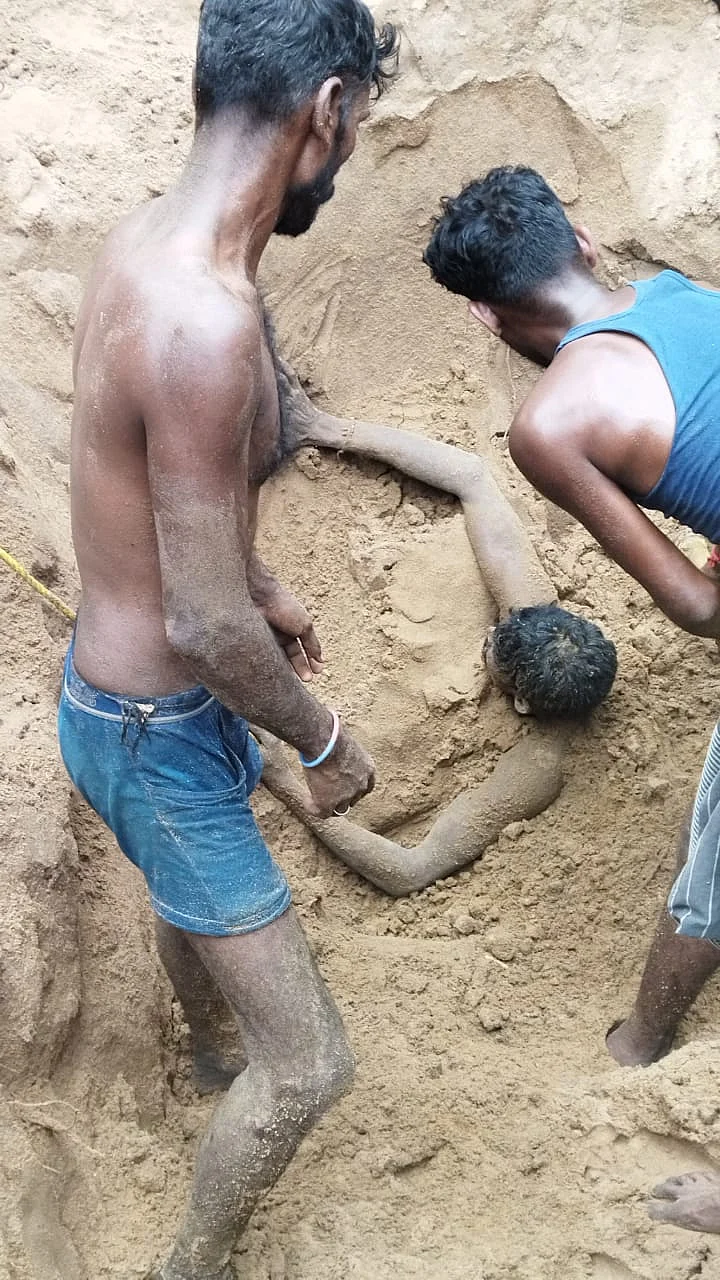 மணல் சரிந்த குழிக்குள் சித்திரவேல்