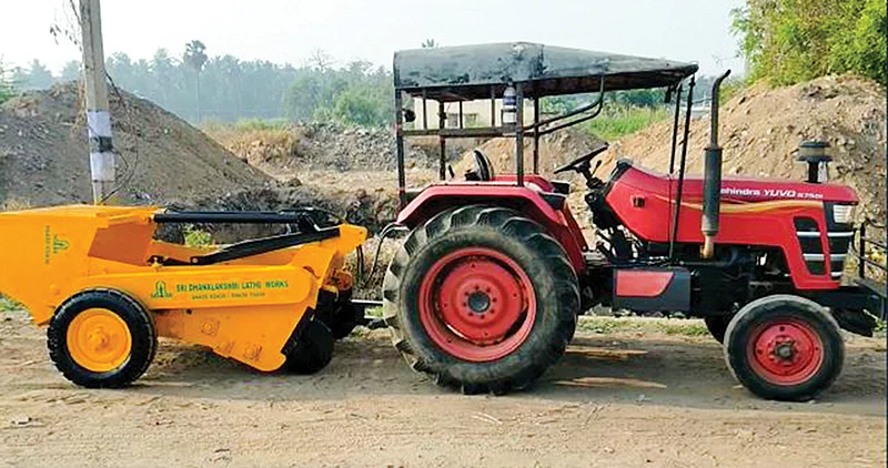 டிராக்டருடன் இணைக்கப்பட்ட கற்களை நீக்கும் கருவி