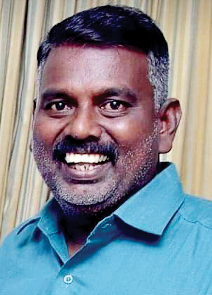 தா.மாலின்.