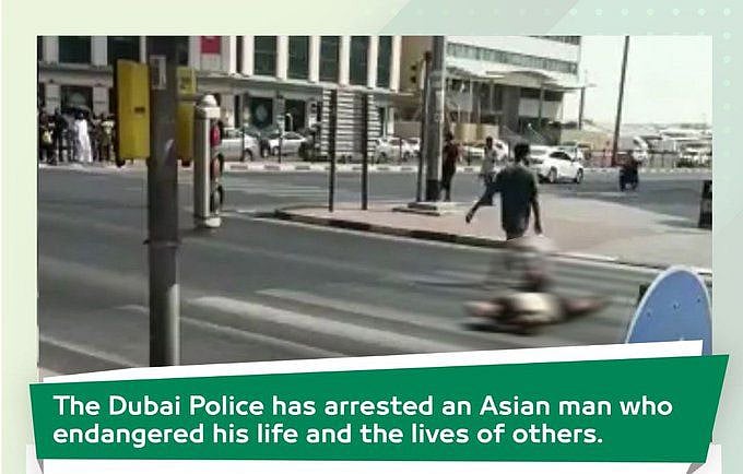 zebra crossing-ல் தலையணை போட்டுப் படுத்தபடி வீடியோ... இளைஞரைக் கைதுசெய்த துபாய் போலீஸ்