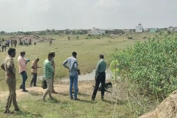 குளத்தில் கிடந்த உடல்