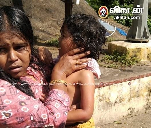 காப்பாற்றப்பட்ட சிறுமியுடன் தாய்