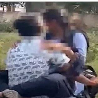 பெட்ரோல் டேங்க்கில் அமரவைத்து வண்டி ஒட்டிய காதலன்