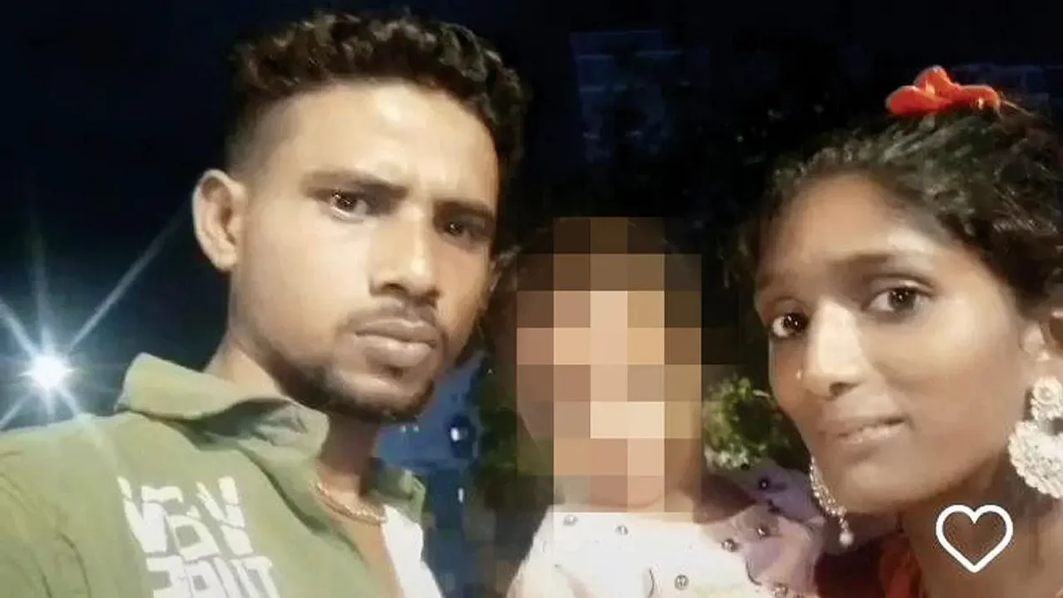 குழந்தையுடன் பெற்றோர்