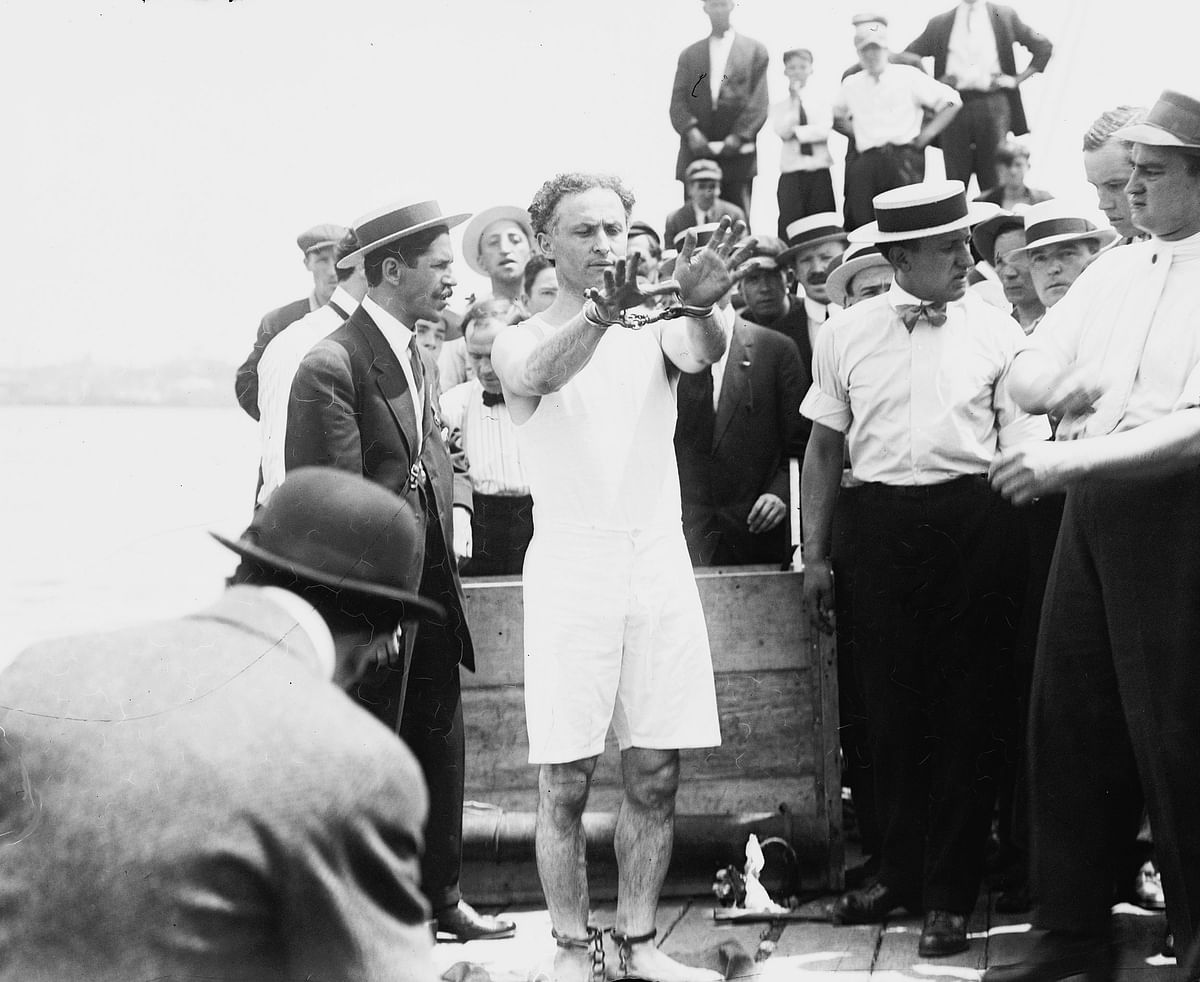 Houdini prepares to do the Overboard box escape circa 1912