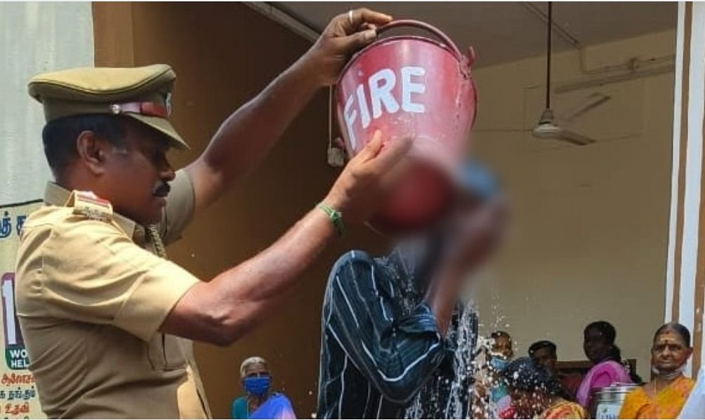 தீக்குளிக்க முயன்ற நபர்