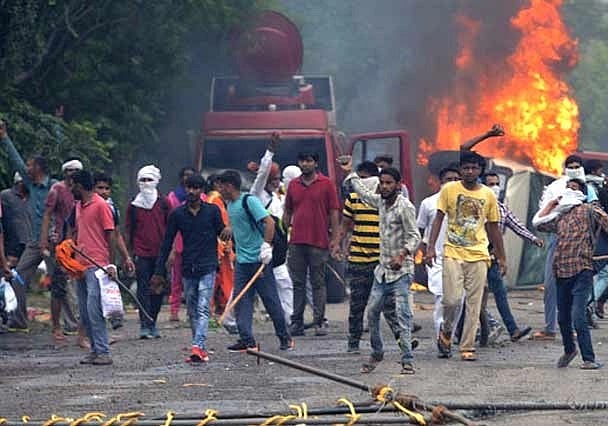 ஹரியானா: `முஸ்லிம்களை வெளியேறச் சொன்னார்கள்; திரும்பிச் செல்லகூட பணம் இல்ல’ - புலம்பெயர்ந்தோர் வேதனை