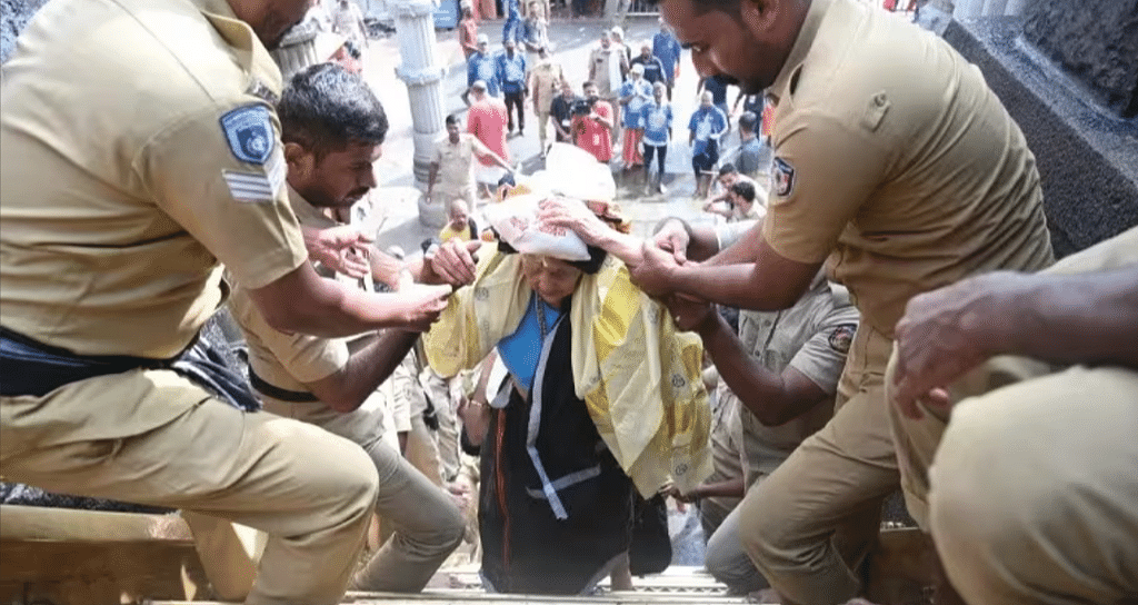 கன்னிசாமியாக பதினெட்டாம் படி ஏறிச்செல்லும் பாறுகுட்டி அம்மா