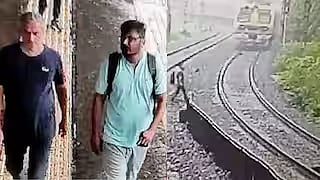 கைகளை பிடித்துக்கொண்டு தண்டவாளத்தில் படுத்து உயிரைவிட்ட தந்தை, மகன் - மும்பை அதிர்ச்சி