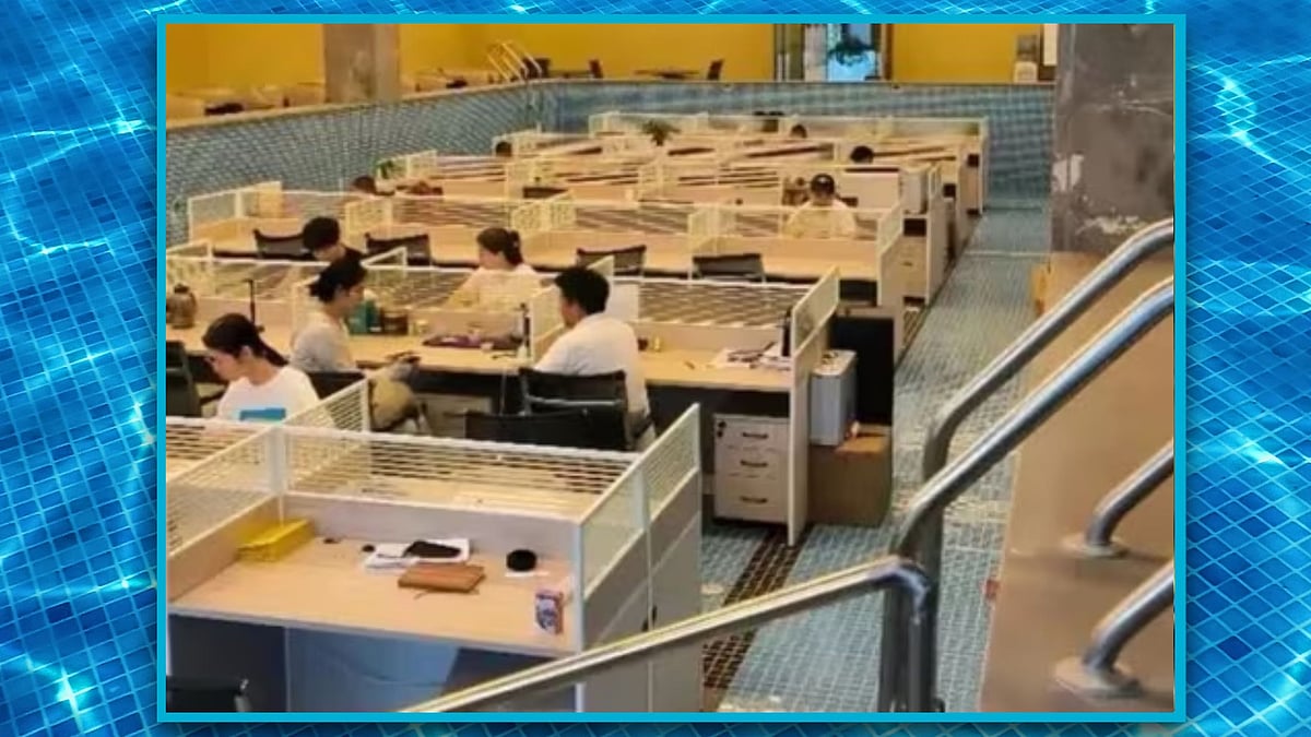 சீனா: அலுவலகமாக மாற்றிய நீச்சல் குளம்; தீயணைப்புத் துறையால் பின்வாங்கிய நிறுவனம்; பின்னணி என்ன?