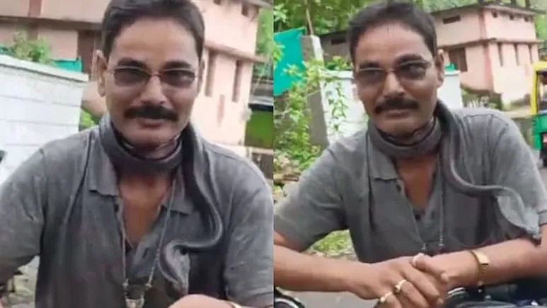 கழுத்தில் பாம்புடன் பைக் ஓட்டிய நபர்; விஷக்கடியால் உயிரிழப்பு - என்ன நடந்தது?