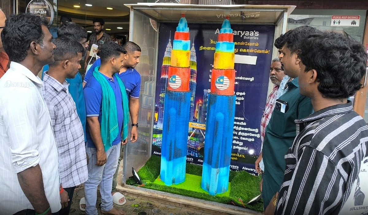 ராமநாதபுரம்: 50 கிலோ சர்க்கரை, 200 முட்டைகள்; புத்தாண்டை வரவேற்கும் மலேசிய இரட்டை கோபுர கேக்!