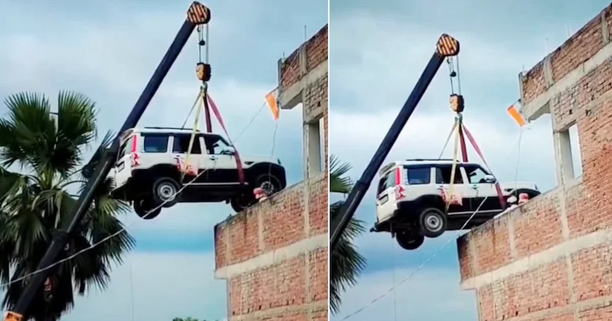 `யாரும் திருடிட கூடாது' கிரேன் மூலம் ஸ்கார்பியோ காரை வீட்டுமாடியில் வைத்துவிட்டு வெளிநாடு சென்ற நபர்