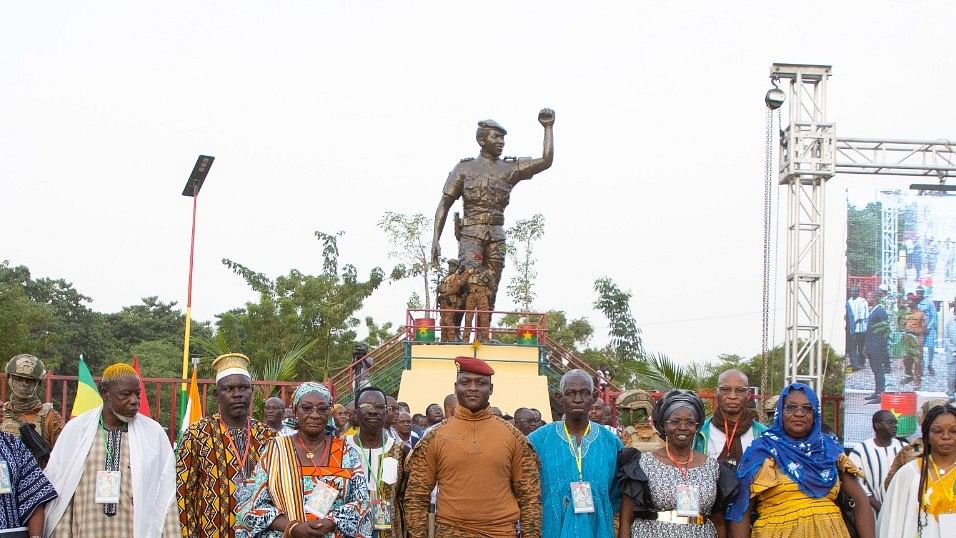 Traore in Front of Thomas Sankara Statue