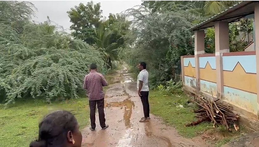 சேறும் சகதியுமான சாலையை ஆய்வு செய்த ஊராட்சி செயலர்