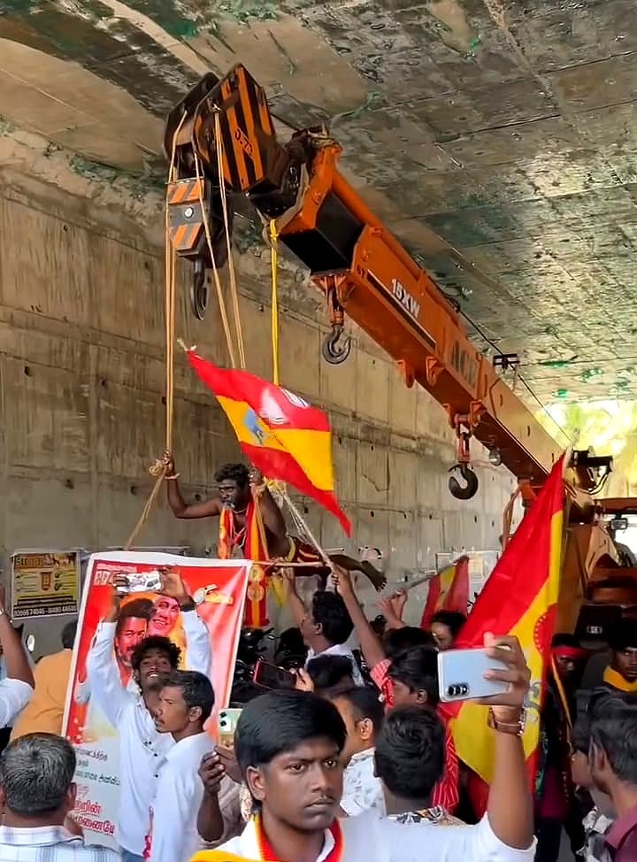 விஜய்க்காக அலகு குத்தி, கிரேனில் தொங்கி சாகசம்; தவெக தொண்டர் கைது; இன்ஸ்பெக்டரைக் கண்டித்த டிஐஜி