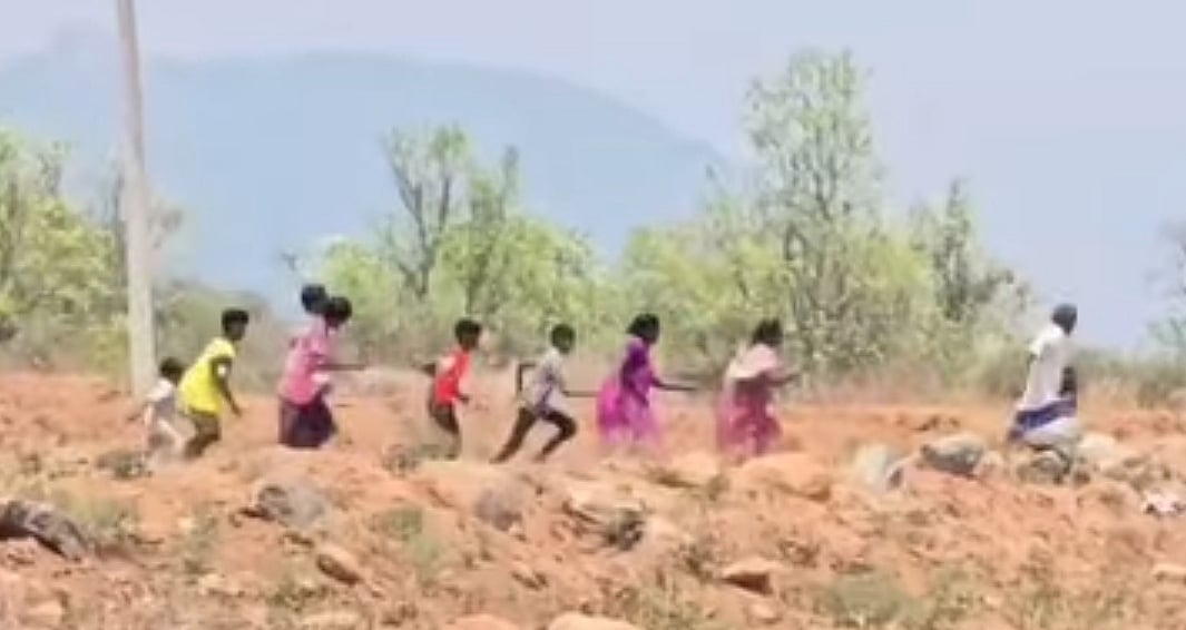 மது வியாபாரி தப்பித்து ஓட்டம்