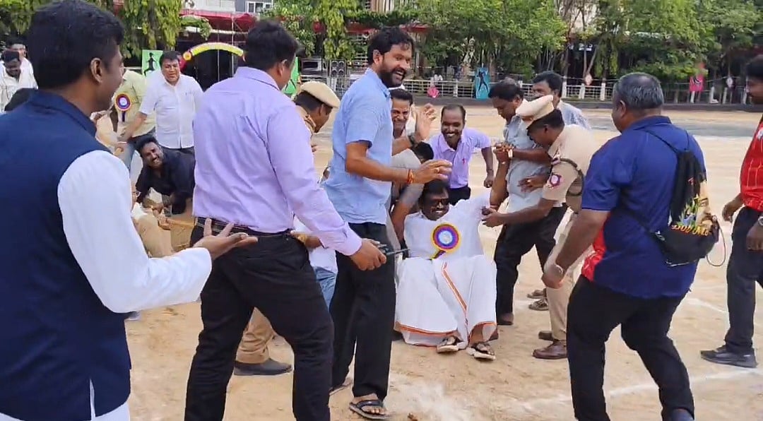 கயிறு இழுக்கும் போட்டியில் நிலைத்தடுமாறி விழுந்த அமைச்சர் லோகேஷ் தமிழ்செல்வன்; சுதாரித்த காவலர்கள்!