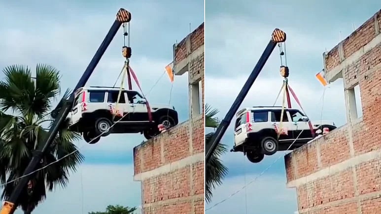 `யாரும் திருடிட கூடாது கிரேன் மூலம் ஸ்கார்பியோ காரை வீட்டுமாடியில் வைத்துவிட்டு வெளிநாடு சென்ற நபர்