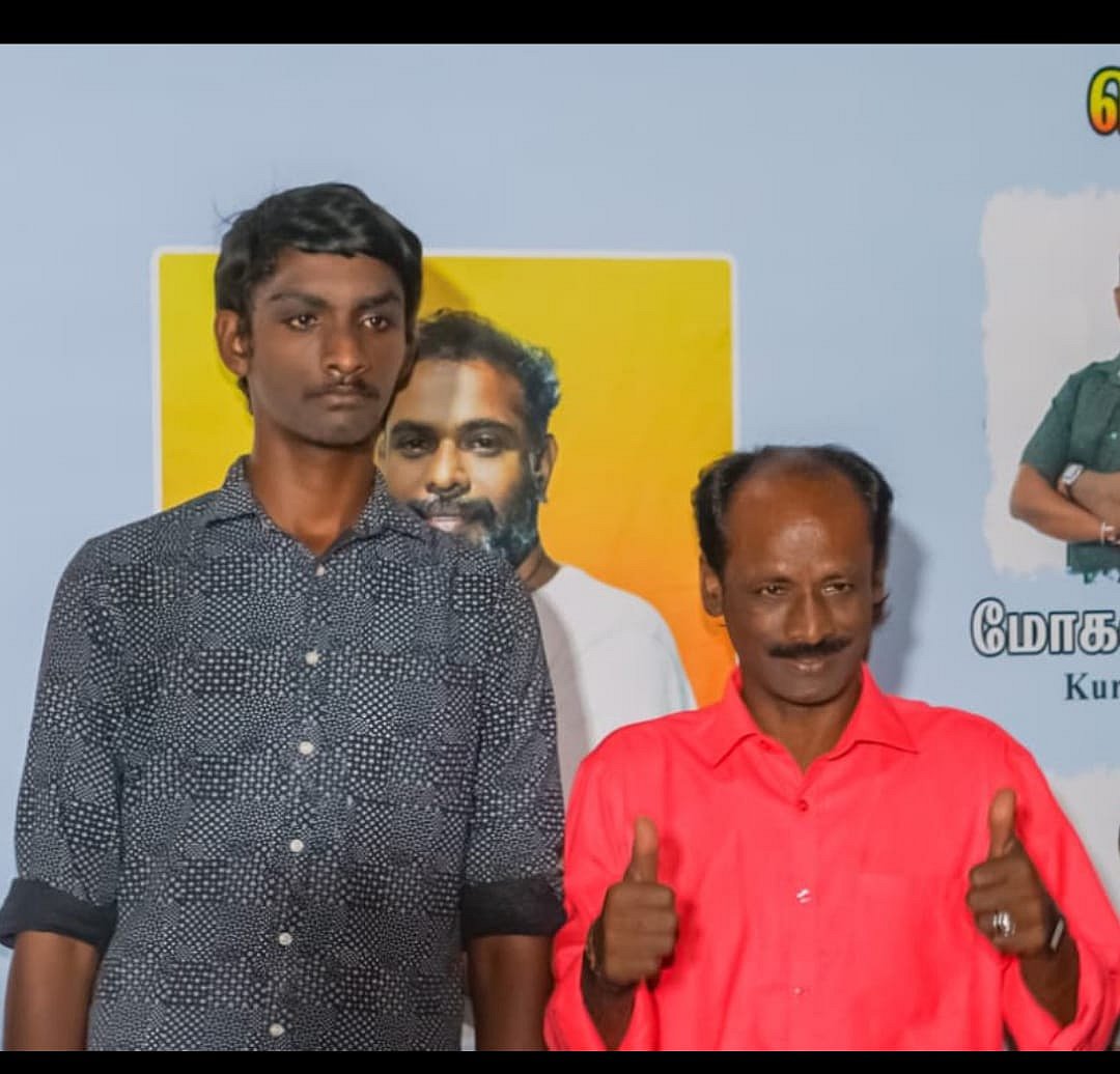 மகனுடன் முத்துக்காளை