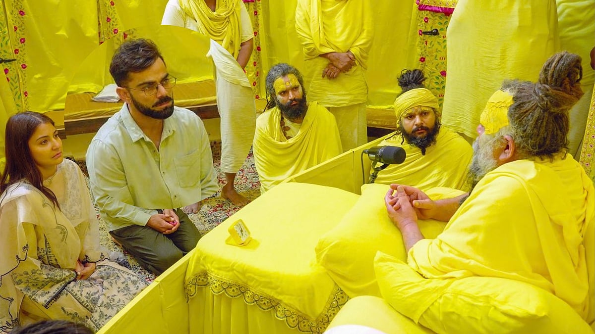 Virat Kohli: ``ஆசிரமத்தைப் பிரபலப்படுத்த ரூ5 கோடி பெற்றேனா? - விராட் கோலி தரப்பு விளக்கம்!